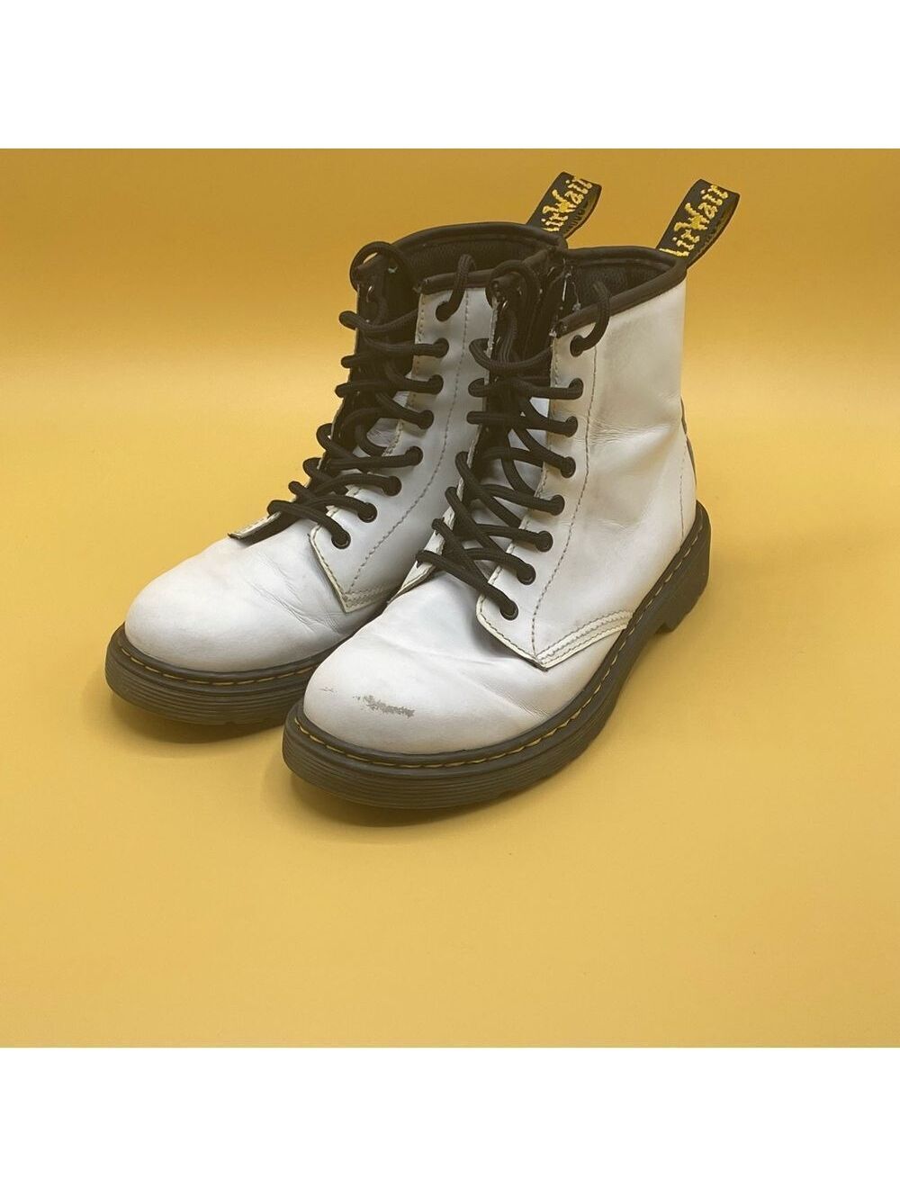 Dr. Martens White Boots with Lace-Up Design and Thick Rubber Sole